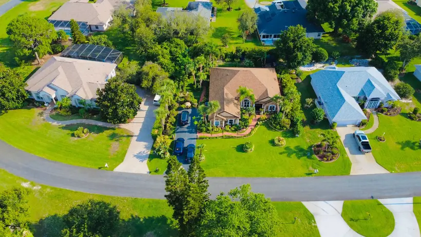 Aerial view of homes along a curving road